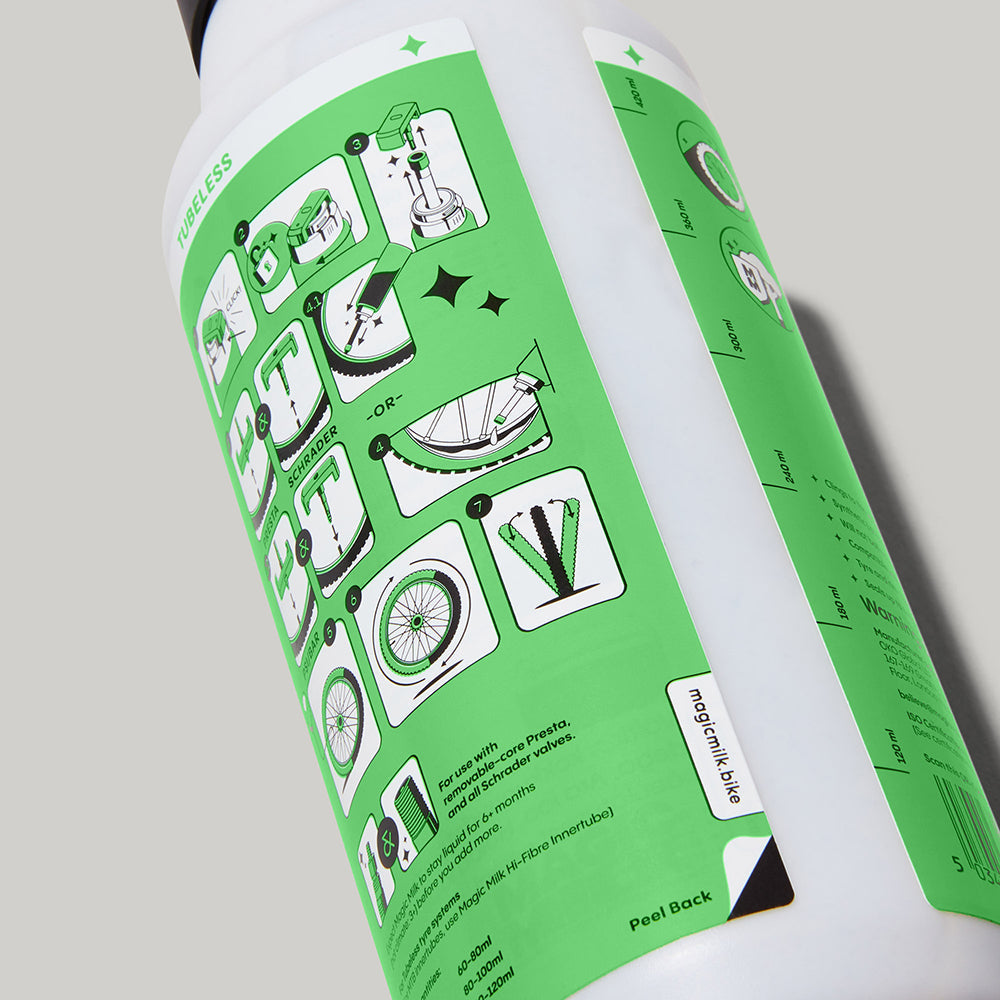 Magic Milk Tubeless Original sealant bottle — studio product photography